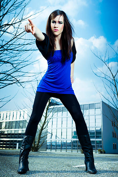 Urban Young Woman Pointing