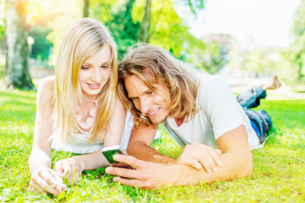 Enjoying Summer Modern Couple Internet Surfing