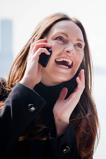 Happy Mobile Phone Call Woman Laughing